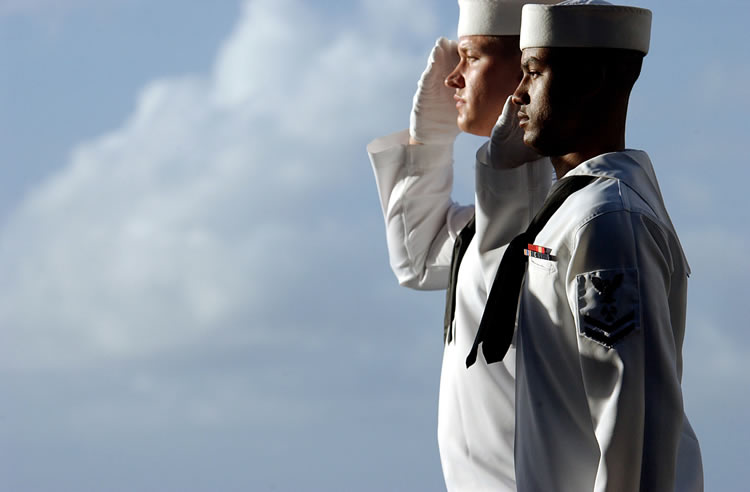 Navy machinists saluting